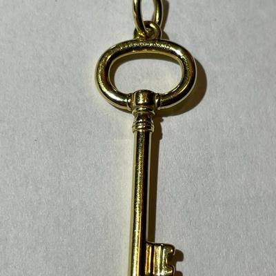 Vintage Tiffany & Co 18k Yellow Gold Key Pendant in VG Preowned Condition.