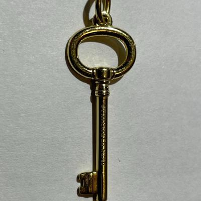 Vintage Tiffany & Co 18k Yellow Gold Key Pendant in VG Preowned Condition.