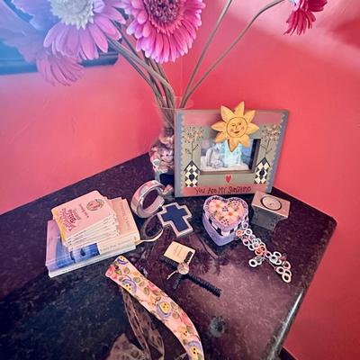 A pretty lot for girls room with a vase of flowers, crosses, J initial, books and a necklace