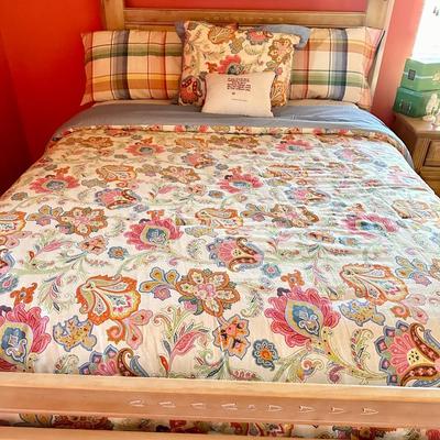 Queen bed, light wood carved, floral, bedding, and pillows