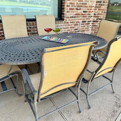 Outdoor table and six Sunbrella chairs, tray and two margarita glasses