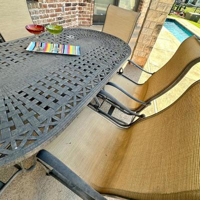 Outdoor table and six Sunbrella chairs, tray and two margarita glasses