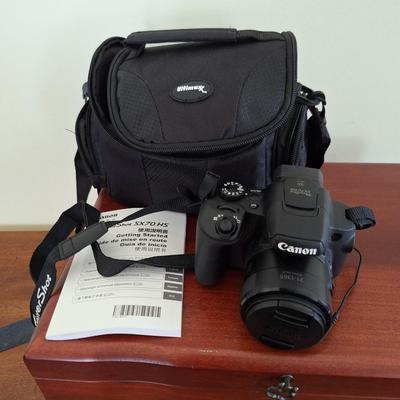 power shot canon camera/bag, selfy stick, charger