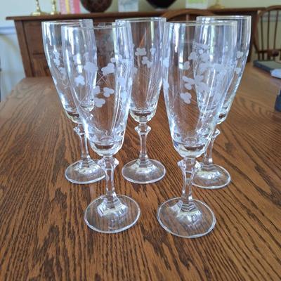 5 etched champagne glasses