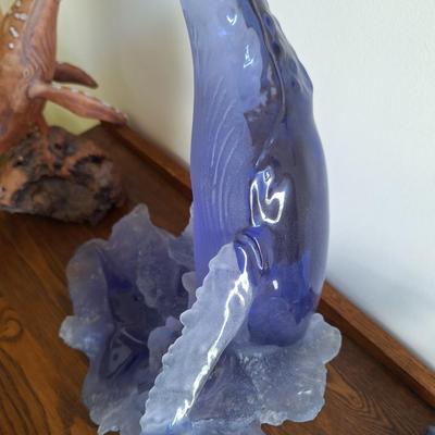 blue glass breaching whale