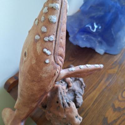 carved driftwood whale