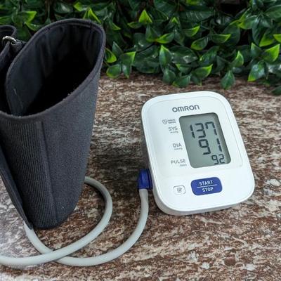 Lot of 2 Heating Pads and a Blood Pressure Machine Missing Battery Lid