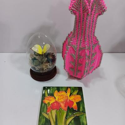 Vintage Taxidermy Butterfly in a cloche dome with Lillies on a tile and a pink decorative vase