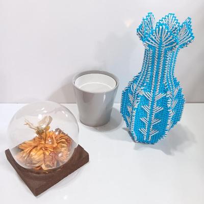 Vintage Taxidermy butterfly cloche dome with small ceramic plant pot and a blue decorative vase