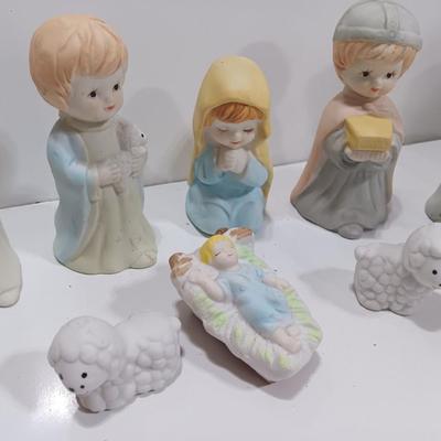 Porcelain Christmas nativity set with vintage Mrs. Claus