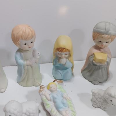 Porcelain Christmas nativity set with vintage Mrs. Claus
