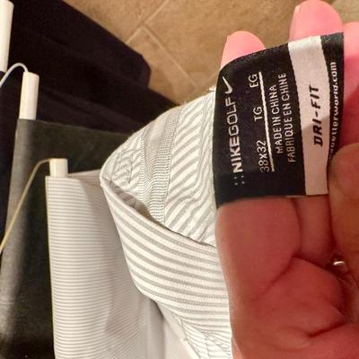 Men’s Nike golf pants and suit pants. Five pair.
