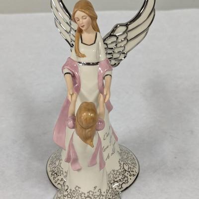 Heirloom Musical Figurine Collection