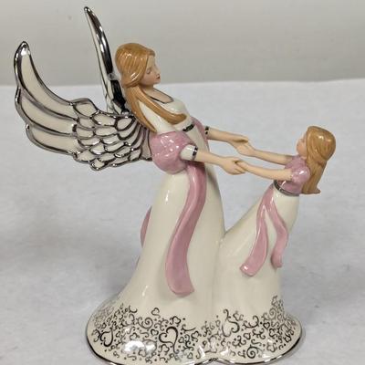 Heirloom Musical Figurine Collection