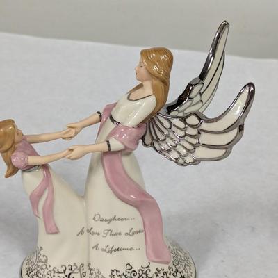 Heirloom Musical Figurine Collection