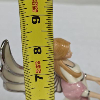 Heirloom Musical Figurine Collection