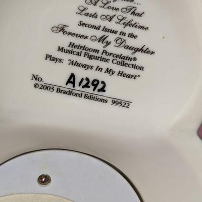 Heirloom Musical Figurine Collection