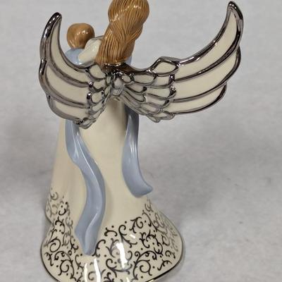Heirloom Musical Figurine Collection