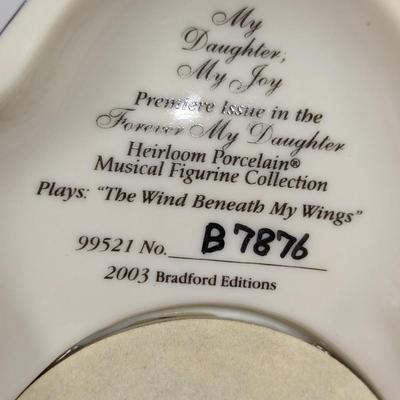 Heirloom Musical Figurine Collection