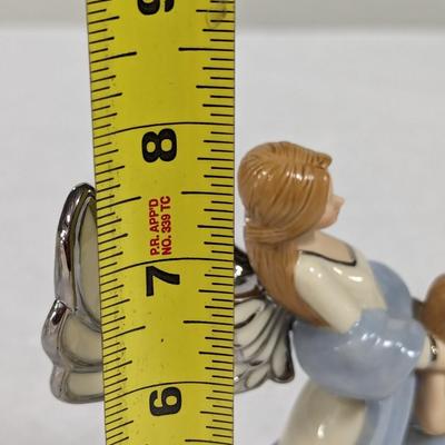 Heirloom Musical Figurine Collection