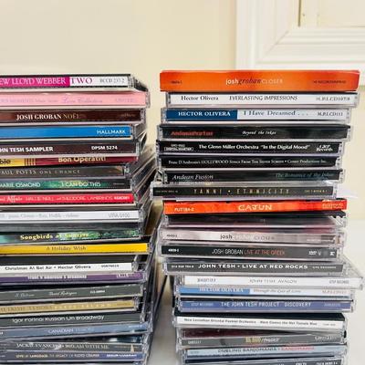 90+ CDS & Wooden CD Holder