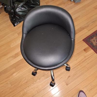 black rolling stool