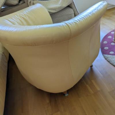 Matching Couch Butter Colored Barrel Leather Chair