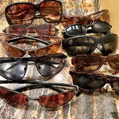 Basket of various sunglasses