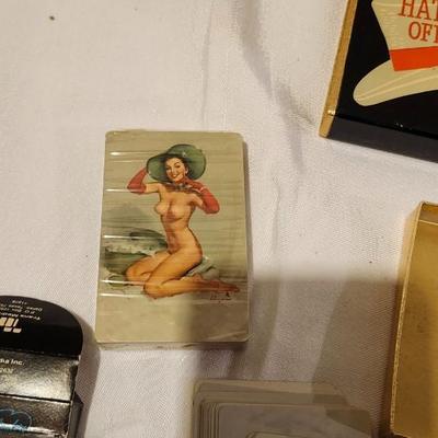 1976 Playboy, Hats off 1950s risque playing cards, and cowboy Cheerleaders card