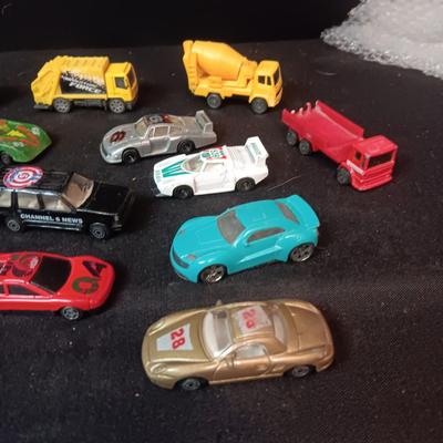 A VARIETY OF TOY CARS