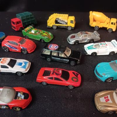 A VARIETY OF TOY CARS