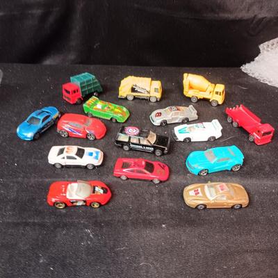 A VARIETY OF TOY CARS