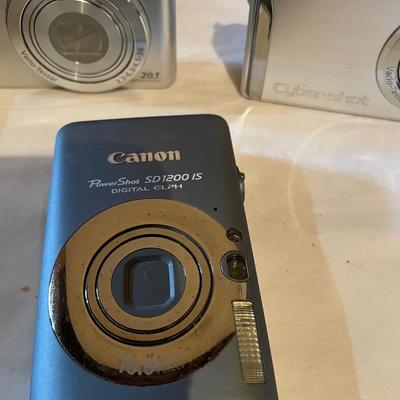 POLAROID AND DIGITAL CAMERAS