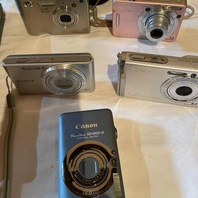 POLAROID AND DIGITAL CAMERAS