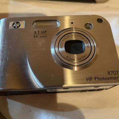 POLAROID AND DIGITAL CAMERAS
