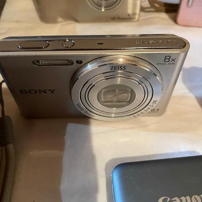 POLAROID AND DIGITAL CAMERAS