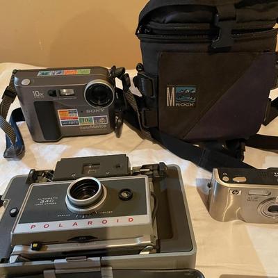 POLAROID AND DIGITAL CAMERAS