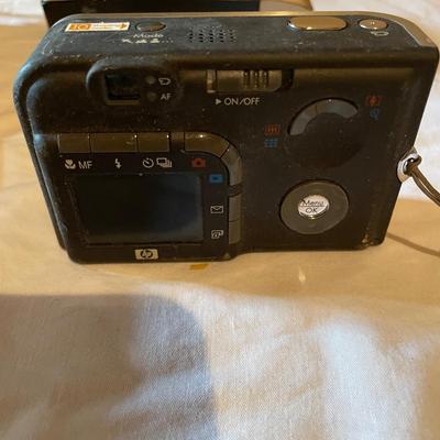 POLAROID AND DIGITAL CAMERAS