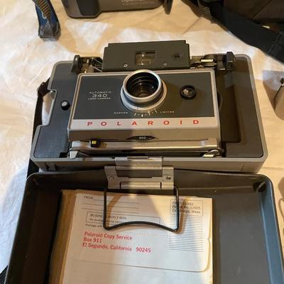 POLAROID AND DIGITAL CAMERAS
