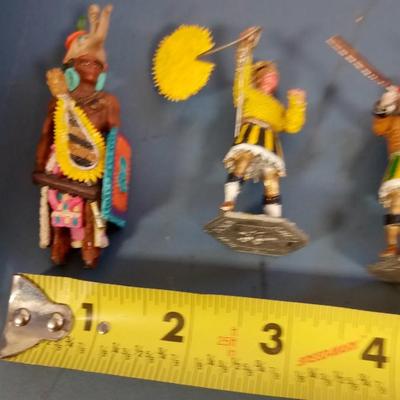 LOT 95 FOUR METAL SOLDIERS