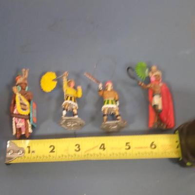 LOT 95 FOUR METAL SOLDIERS