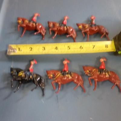 LOT 100 SIX OLD METAL HORSE SOLDIERS
