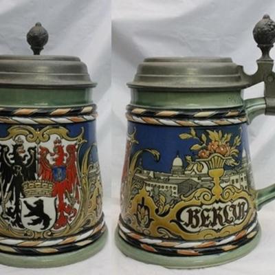 Mettlach #2024 Beer Stein 1/2 Liter. 5 1/2" Tall. Mettlach Circa 1898 Hand-painted, Etched body that features the Berlin Crest in VG...