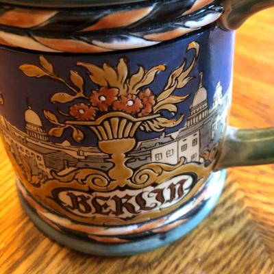Mettlach #2024 Beer Stein 1/2 Liter. 5 1/2" Tall. Mettlach Circa 1898 Hand-painted, Etched body that features the Berlin Crest in VG...