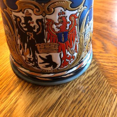 Mettlach #2024 Beer Stein 1/2 Liter. 5 1/2" Tall. Mettlach Circa 1898 Hand-painted, Etched body that features the Berlin Crest in VG...