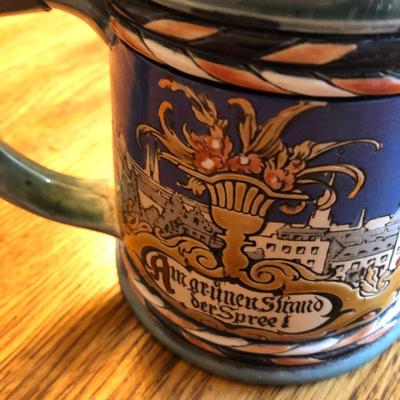 Mettlach #2024 Beer Stein 1/2 Liter. 5 1/2" Tall. Mettlach Circa 1898 Hand-painted, Etched body that features the Berlin Crest in VG...