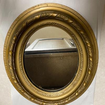 Antique Oval Gold Leaf Painted Mirror w/Wooden Back 12.25" Wide x 14.50" Tall in Good Preowned Condition.