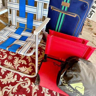 Suitcase, outdoor chair, stadium chairs and a blow up bed
