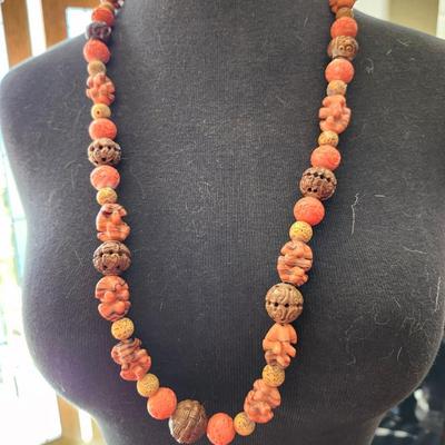 Carved bead necklace