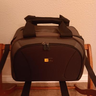 CASE LOGIC SUITCASE ON 2 WHEELS AND CARRY-ON PLUS A FOLDING LUGGAGE RACK